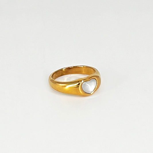 Lustrous pearl centred gold finish ring