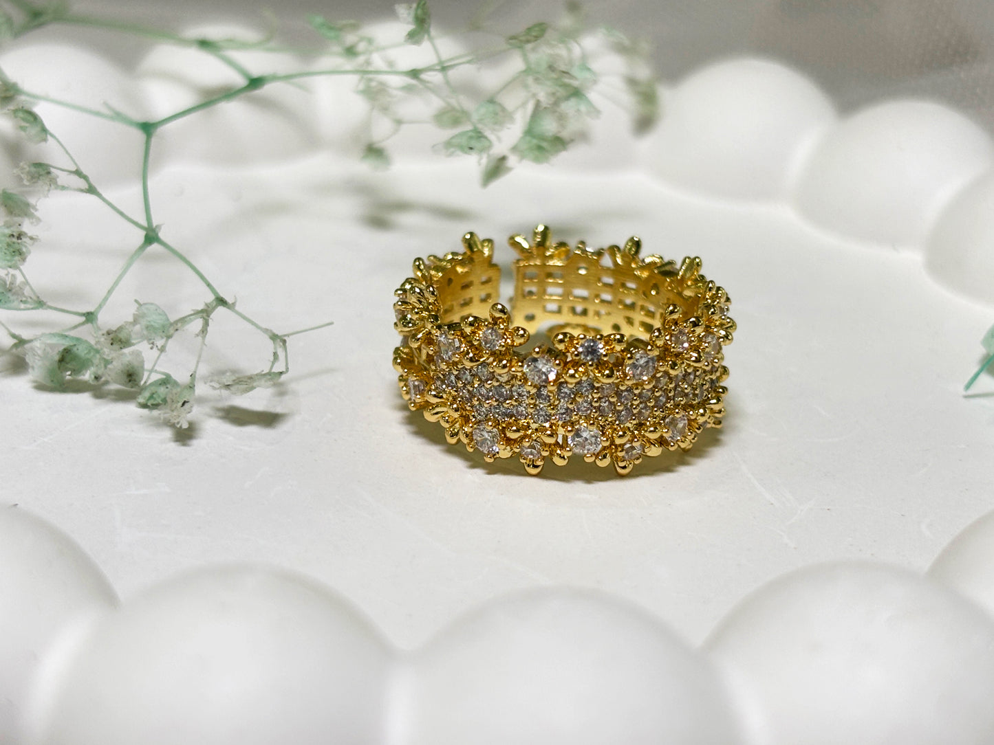 Triple row gold and crystal ring