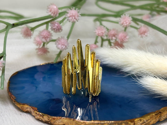Gold tone abstract ring