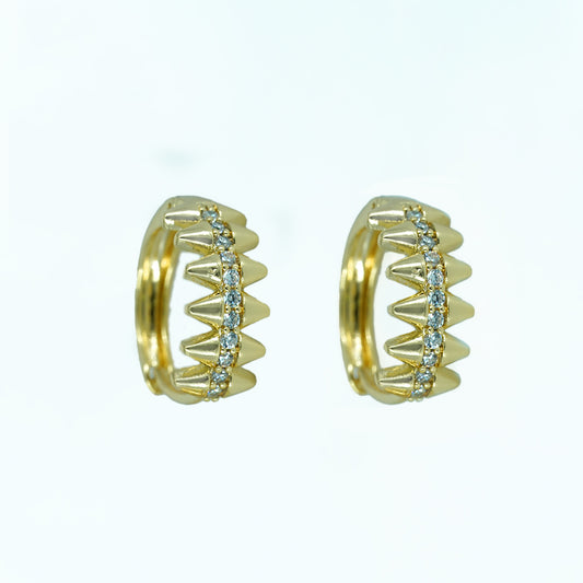 Gold stud earrings sharp edged