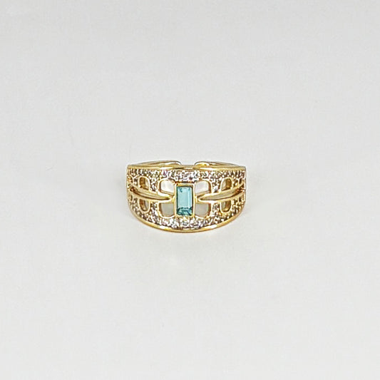 Intricate zircon ring with striking green stone